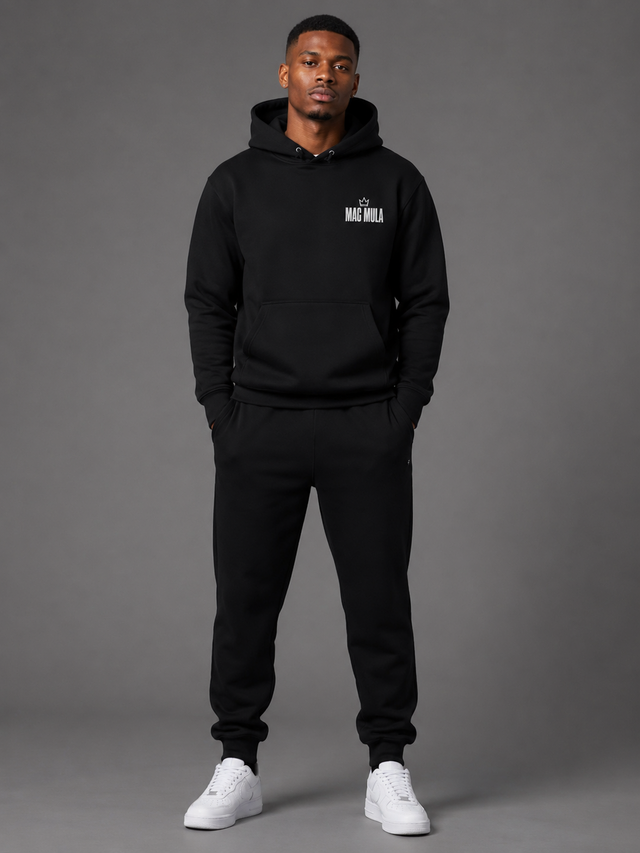 Model wearing the MAC MULA Crown Essential Hoodie in black, front view