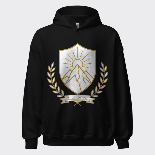 Refined gold monoline summit crest with laurel sprigs and EST. 2026 banner on a black heavyweight hoodie